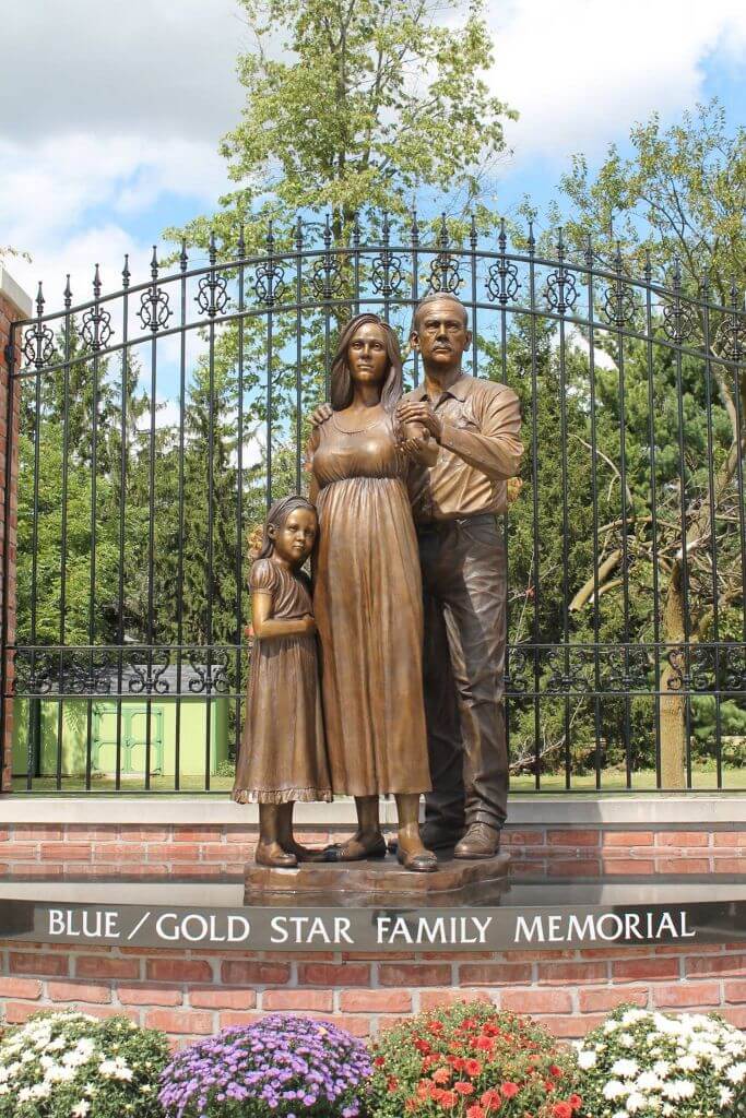 Bronze sculpture of military family by Benjamin Victor.