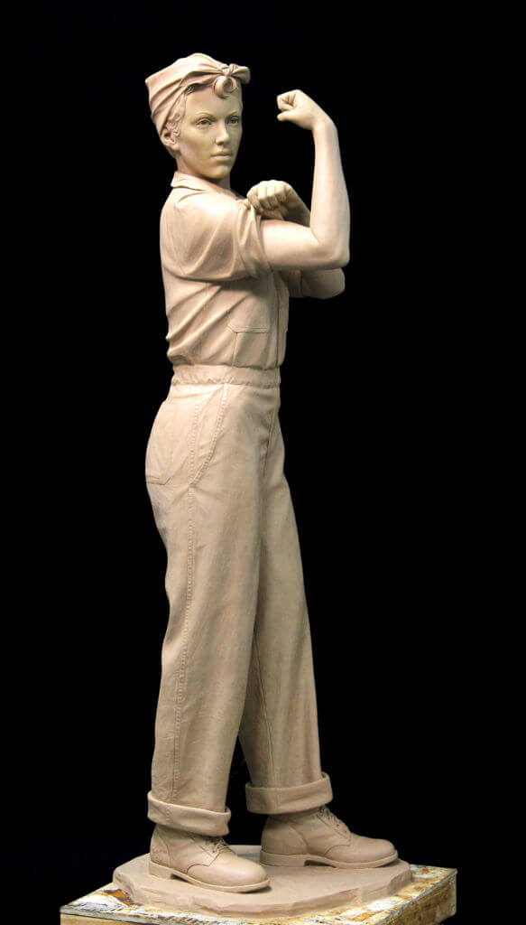 Bronze sculpture of Rosie The Riveter. Life size statue of Rosie The Riveter.