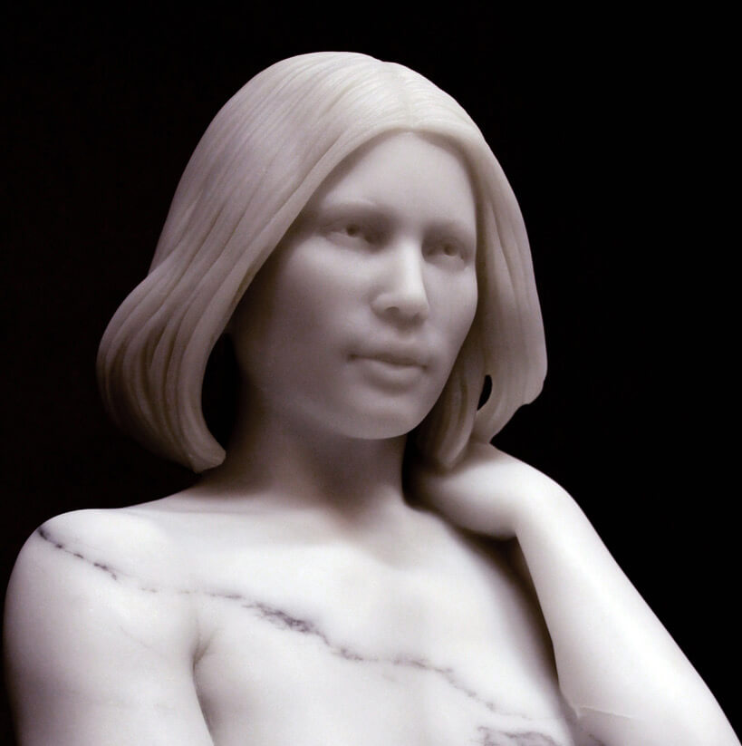 Marble bust of a beautiful woman. Marble sculpture bust.